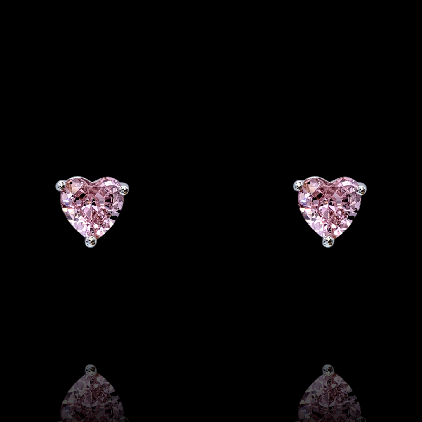 Herzohrringe aus rhodiniertem 925er Silber und rosafarbenen Zirkonia (6 mm)